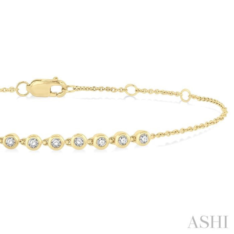 1/5 Ctw Bezel Round Cut Diamond Petite Bracelet in 10K Yellow Gold 1/5 Ctw Bezel Round Cut Diamond Petite Bracelet in 10K Yellow Gold