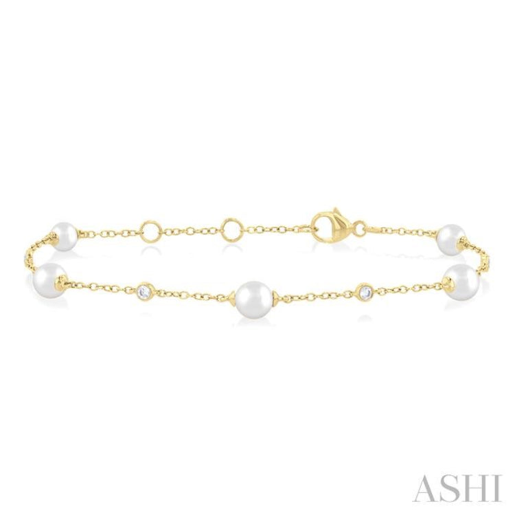 5 MM Round Shape Cultured Pearl and 1/6 Ctw Round Cut Diamond Fashion Station Bracelet in 14K Yellow Gold 5 MM Round Shape Cultured Pearl and 1/6 Ctw Round Cut Diamond Fashion Station Bracelet in 14K Yellow Gold