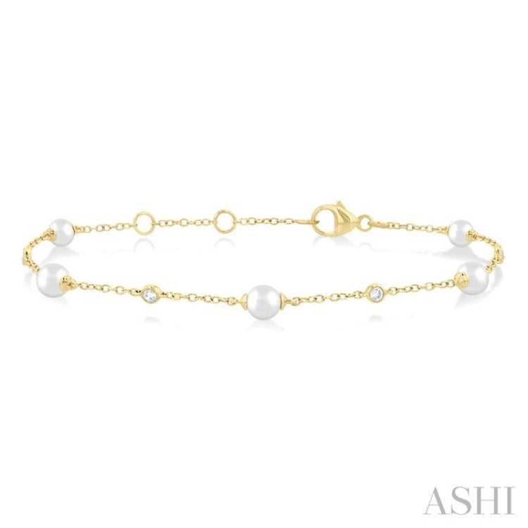 4 MM Round Shape Cultured Pearl and 1/20 Ctw Round Cut Diamond Fashion Station Bracelet in 14K Yellow Gold 4 MM Round Shape Cultured Pearl and 1/20 Ctw Round Cut Diamond Fashion Station Bracelet in 14K Yellow Gold