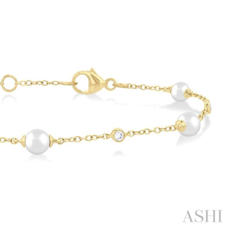 4 MM Round Shape Cultured Pearl and 1/20 Ctw Round Cut Diamond Fashion Station Bracelet in 14K Yellow Gold 4 MM Round Shape Cultured Pearl and 1/20 Ctw Round Cut Diamond Fashion Station Bracelet in 14K Yellow Gold
