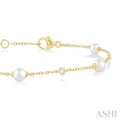 4 MM Round Shape Cultured Pearl and 1/20 Ctw Round Cut Diamond Fashion Station Bracelet in 14K Yellow Gold 4 MM Round Shape Cultured Pearl and 1/20 Ctw Round Cut Diamond Fashion Station Bracelet in 14K Yellow Gold