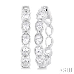 1 1/10 Ctw Bezel Set Oval Cut Diamond Fashion Hoop Earring in 14K White Gold 1 1/10 Ctw Bezel Set Oval Cut Diamond Fashion Hoop Earring in 14K White Gold