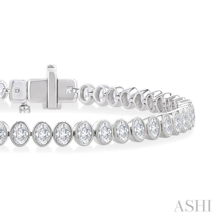 4 5/8 Ctw North-South Bezel Set Oval Cut Diamond Tennis Bracelet in 14K White Gold 4 5/8 Ctw North-South Bezel Set Oval Cut Diamond Tennis Bracelet in 14K White Gold