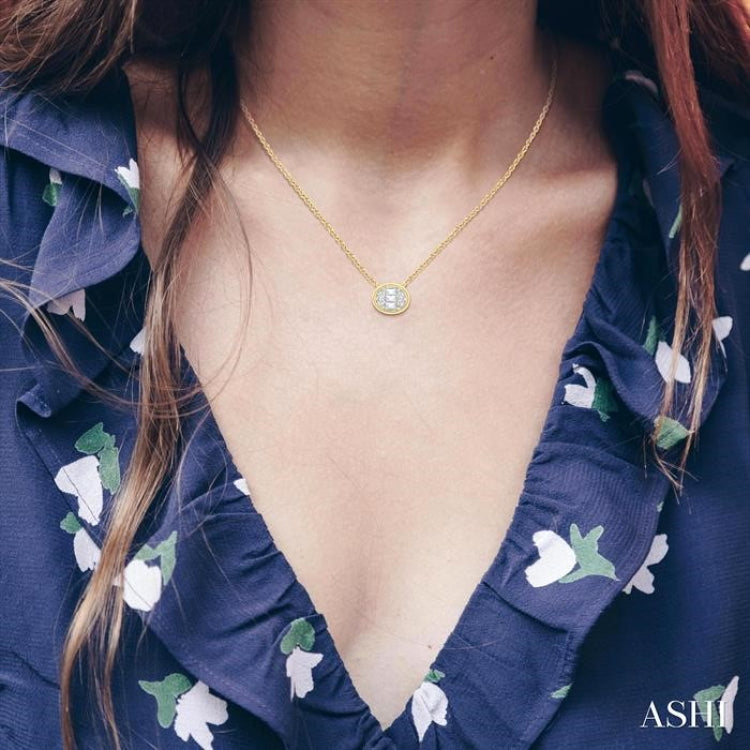 1/6 Ctw Petite Bezel Set East-West Oval Shape Fusion Baguette and Round Cut Diamond Fashion Pendant With Chain in 10K Yellow Gold 1/6 Ctw Petite Bezel Set East-West Oval Shape Fusion Baguette and Round Cut Diamond Fashion Pendant With Chain in 10K Yellow Gold