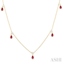 5x3 MM Pear Shape Ruby and 1/8 Ctw Round Cut Diamonds Precious Station Necklace in 10K Yellow Gold 5x3 MM Pear Shape Ruby and 1/8 Ctw Round Cut Diamonds Precious Station Necklace in 10K Yellow Gold