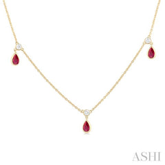 5x3 MM Pear Shape Ruby and 1/8 Ctw Round Cut Diamonds Precious Station Necklace in 10K Yellow Gold 5x3 MM Pear Shape Ruby and 1/8 Ctw Round Cut Diamonds Precious Station Necklace in 10K Yellow Gold