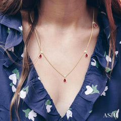 5x3 MM Pear Shape Ruby and 1/8 Ctw Round Cut Diamonds Precious Station Necklace in 10K Yellow Gold 5x3 MM Pear Shape Ruby and 1/8 Ctw Round Cut Diamonds Precious Station Necklace in 10K Yellow Gold