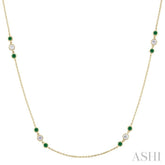 2.25 MM Emerald and 1/2 Ctw Round Cut Diamond Precious Station Necklace in 14K Yellow Gold