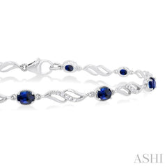4X3 MM Oval Cut Sapphire and 1/5 Ctw Round Cut Diamond Precious Eternity Link Tennis Bracelet in 10K White Gold 4X3 MM Oval Cut Sapphire and 1/5 Ctw Round Cut Diamond Precious Eternity Link Tennis Bracelet in 10K White Gold