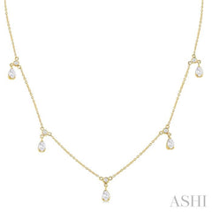 5/8 Ctw Dangle Pear and Round Cut Diamond Station Necklace in 14K Yellow Gold 5/8 Ctw Dangle Pear and Round Cut Diamond Station Necklace in 14K Yellow Gold