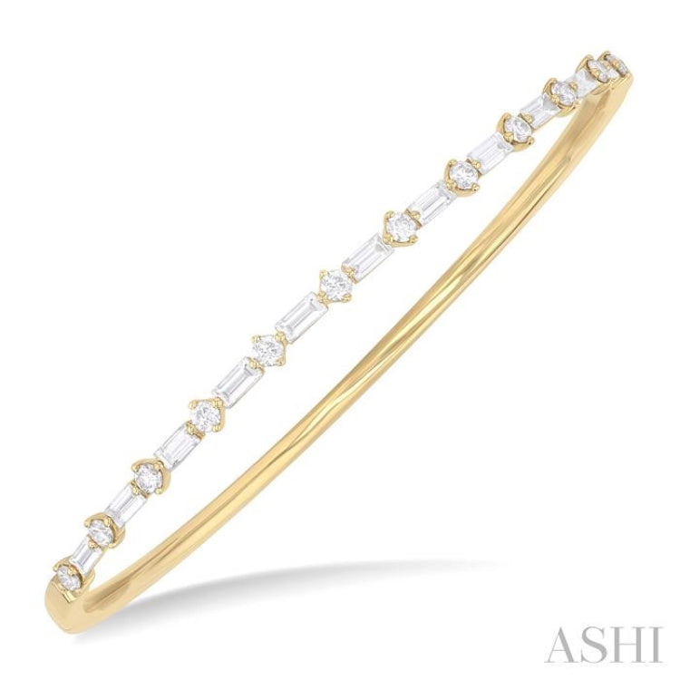 1 1/4 Ctw Baguette and Round Cut Diamond Fashion Bangle in 14K Yellow Gold 1 1/4 Ctw Baguette and Round Cut Diamond Fashion Bangle in 14K Yellow Gold