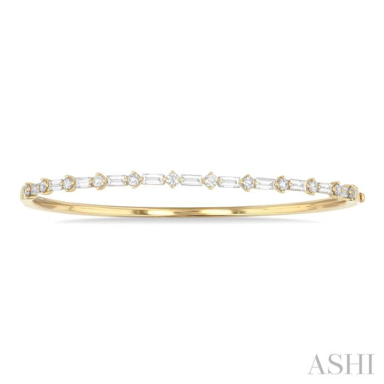 1 1/4 Ctw Baguette and Round Cut Diamond Fashion Bangle in 14K Yellow Gold 1 1/4 Ctw Baguette and Round Cut Diamond Fashion Bangle in 14K Yellow Gold