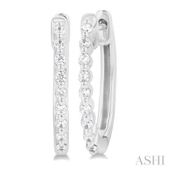 1/6 Ctw Petite Shared Prong Round Cut Diamond Hoop Earring in Sterling Silver 1/6 Ctw Petite Shared Prong Round Cut Diamond Hoop Earring in Sterling Silver