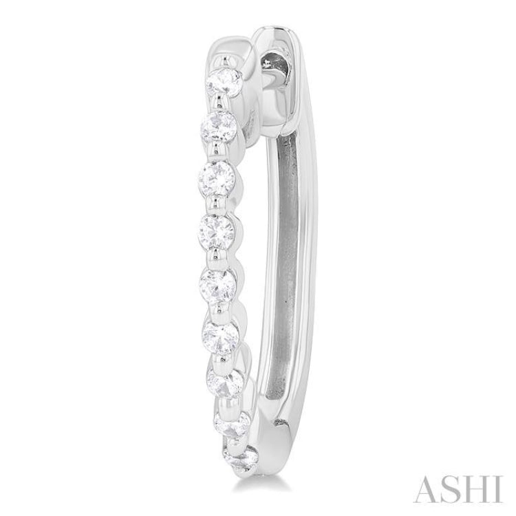 1/6 Ctw Petite Shared Prong Round Cut Diamond Hoop Earring in Sterling Silver 1/6 Ctw Petite Shared Prong Round Cut Diamond Hoop Earring in Sterling Silver