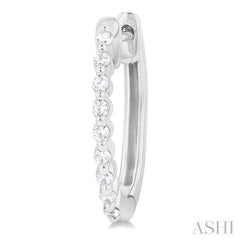 1/6 Ctw Petite Shared Prong Round Cut Diamond Hoop Earring in Sterling Silver 1/6 Ctw Petite Shared Prong Round Cut Diamond Hoop Earring in Sterling Silver