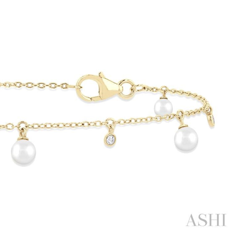 3 MM Round Shape Cultured Pearl and 1/20 Ctw Round Cut Diamond Station Bracelet in 14K Yellow Gold 3 MM Round Shape Cultured Pearl and 1/20 Ctw Round Cut Diamond Station Bracelet in 14K Yellow Gold