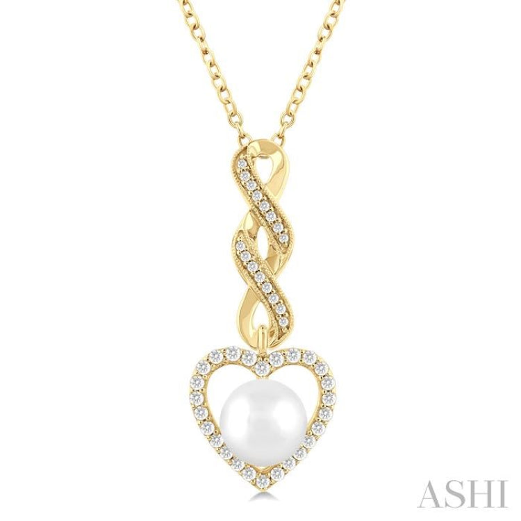 7 MM Round Shape Cultured Pearl and 1/4 Ctw Heart Frame Round Cut Diamond Fashion Pendant With Chain in 10K Yellow Gold 7 MM Round Shape Cultured Pearl and 1/4 Ctw Heart Frame Round Cut Diamond Fashion Pendant With Chain in 10K Yellow Gold