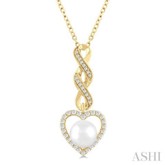 7 MM Round Shape Cultured Pearl and 1/4 Ctw Heart Frame Round Cut Diamond Fashion Pendant With Chain in 10K Yellow Gold 7 MM Round Shape Cultured Pearl and 1/4 Ctw Heart Frame Round Cut Diamond Fashion Pendant With Chain in 10K Yellow Gold