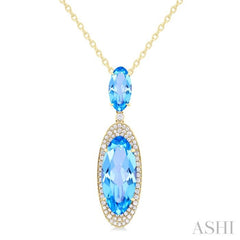 18x8 MM & 10x5 MM Oval Cut Blue Topaz and 1/3 Ctw Round Cut Diamond Halo Semi-Precious Pendant With Chain in 14K Yellow Gold 18x8 MM & 10x5 MM Oval Cut Blue Topaz and 1/3 Ctw Round Cut Diamond Halo Semi-Precious Pendant With Chain in 14K Yellow Gold