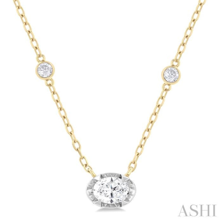 1/4 Ctw Oval and Bezel Set Round Cut Diamond Station Necklace in 14K Yellow and White Gold 1/4 Ctw Oval and Bezel Set Round Cut Diamond Station Necklace in 14K Yellow and White Gold