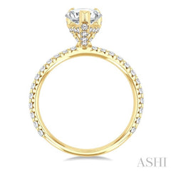 5/8 Ctw Round Cut Diamond Pear Shape Semi-Mount Engagement Ring in 14K Yellow Gold