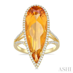 26x9 MM Pear Shape Citrine and 1/3 Ctw Round Cut Diamond Halo Semi-Precious Ring in 14K Yellow Gold