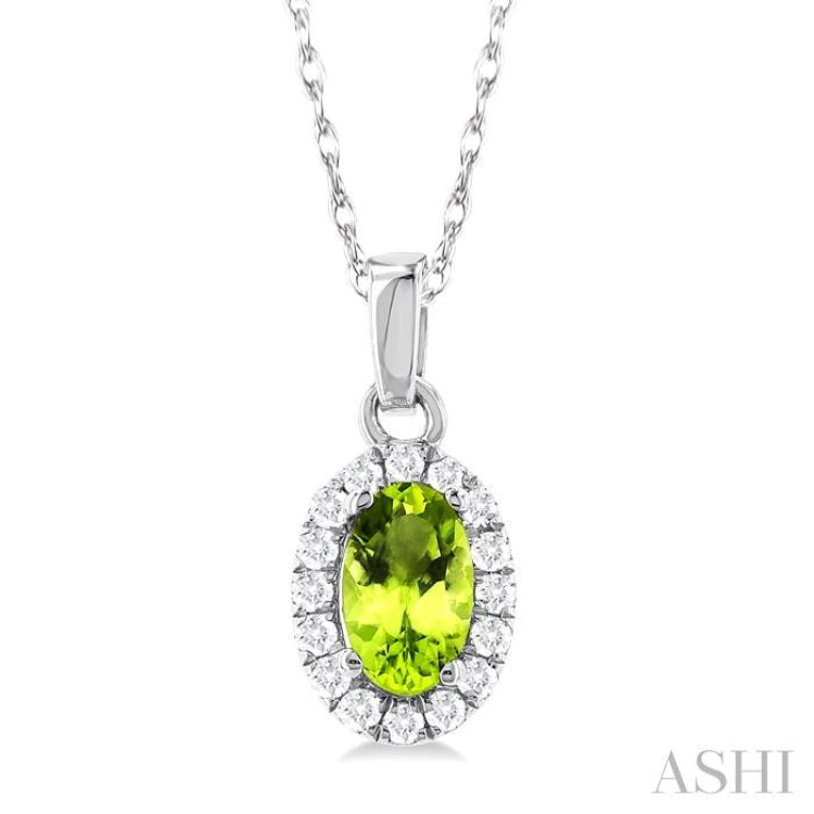 5x3 MM Oval Shape Peridot and 1/20 Ctw Single Cut Diamond Halo Semi-Precious Pendant with Chain in 14K White Gold