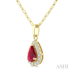 6x4 MM Pear Shape Ruby and 1/6 Ctw Round Cut Diamond Halo Precious Pendant with Chain in 14K Yellow Gold