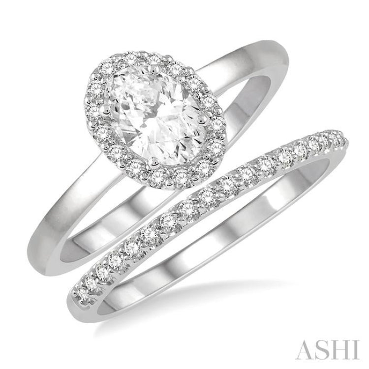 3/8 Ctw Round Cut Diamond Wedding Set With 1/3 Ct Halo 1/4 Ct Oval Cut Center Stone Engagement Ring and 1/10 Ct Wedding Band in 14K White Gold