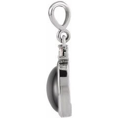 Sterling Silver 9x7 mm Natural Black Onyx & .03 CT Natural Diamond Cabochon Pendant