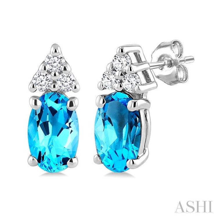 1/20 Ctw Oval Cut 5X3 MM Blue Topaz and Round Cut Diamond semi-precious Earrings in 10K White Gold