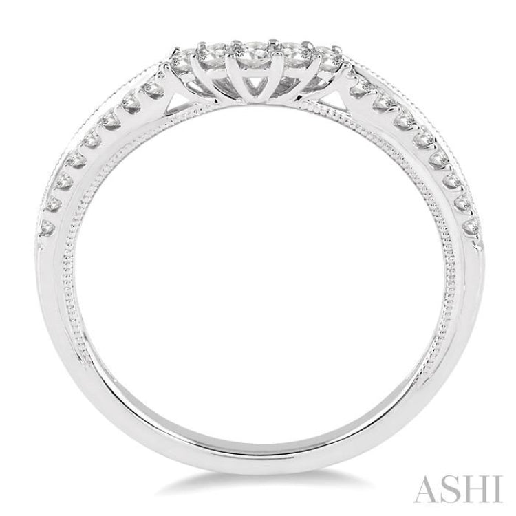 1/4 Ctw Round Cut Diamond Wedding Band in 14K White Gold