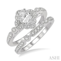 3/4 Ctw Round Cut Diamond Wedding Set With 5/8 Ctw Oval Cut Floral Engagement Ring and 1/10 Ctw Lattice Wedding Band in 14K White Gold