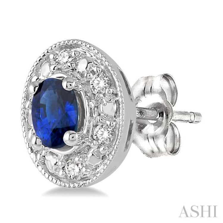 4x3 MM Oval Shaped Sapphire and 1/10 ctw Single Cut Diamond Earrings in 14K White Gold