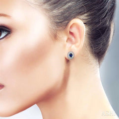 4x3 MM Oval Shaped Sapphire and 1/10 ctw Single Cut Diamond Earrings in 14K White Gold