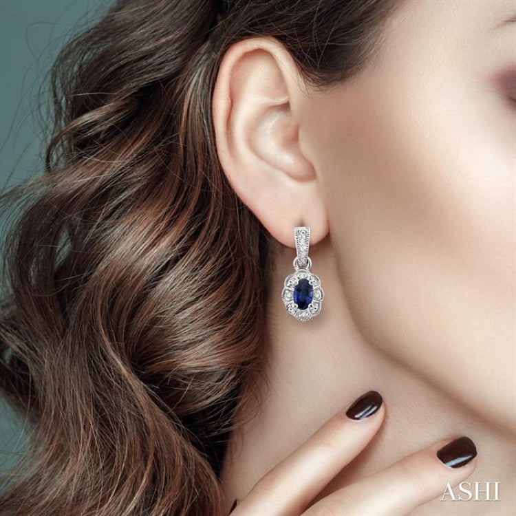 5x3 MM Oval Cut Sapphire and 1/20 Ctw Round Cut Diamond Earrings in Sterling Silver