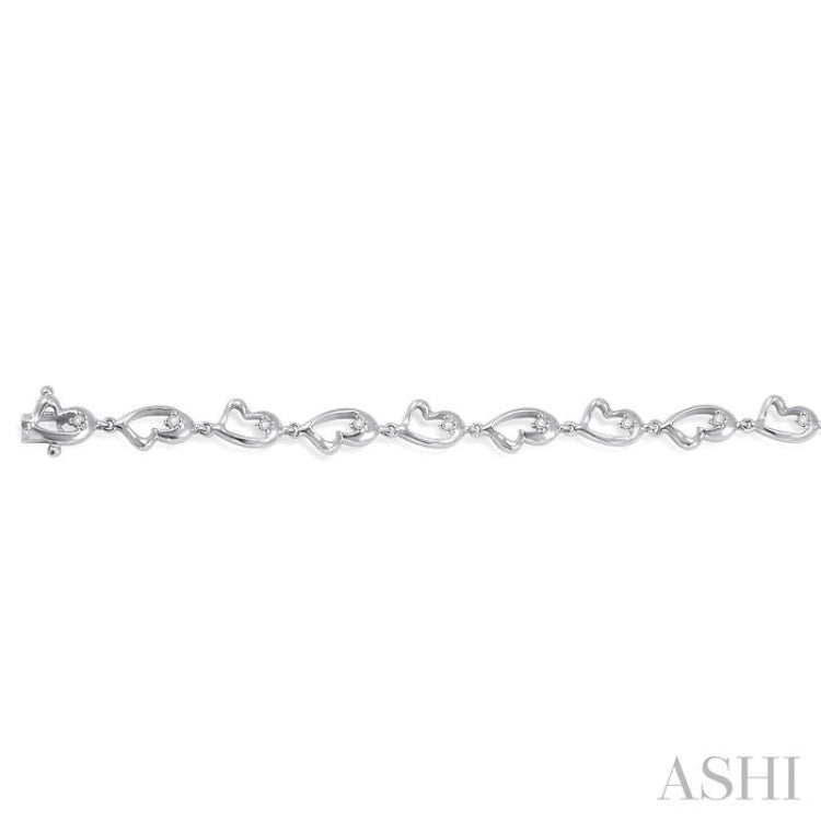 1/20 Ctw Heart Shape Round Cut Diamond Bracelet in Sterling Silver
