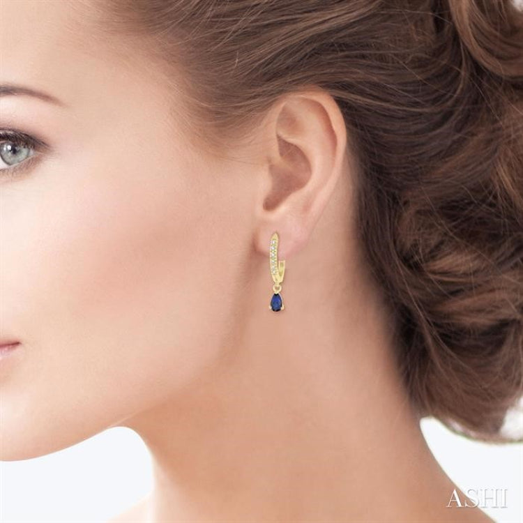 5x3 MM Pear Cut Sapphire and 1/8 Ctw Round Cut Diamond Petite Fashion Huggie Earrings in 10K Yellow Gold