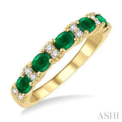 4x3 MM Oval Shape Emerald and 1/6 Ctw Round Cut Diamond Precious Band in 14K Yellow Gold