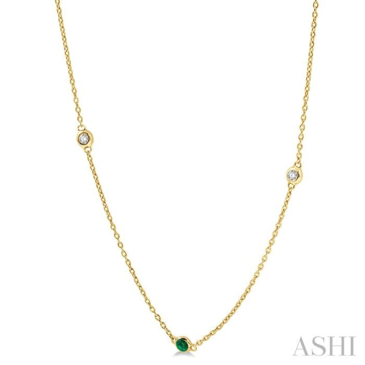 1.75 MM Emerald and 1/6 Ctw Round Cut Diamond Precious Station Necklace in 14K Yellow Gold