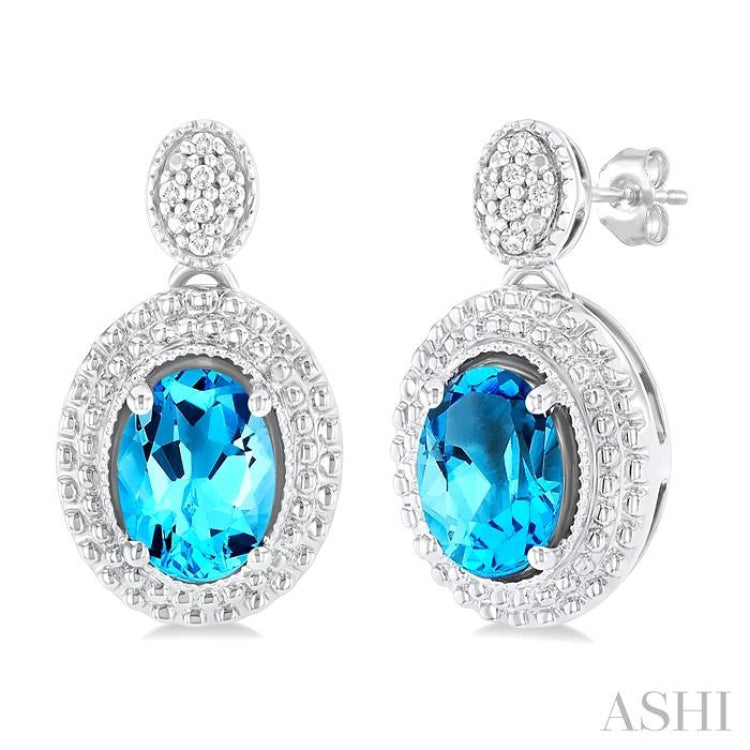 7X5 MM Oval Cut Blue Topaz and 1/20 Ctw Round Cut Diamond Semi-Precious Earring in Sterling Silver