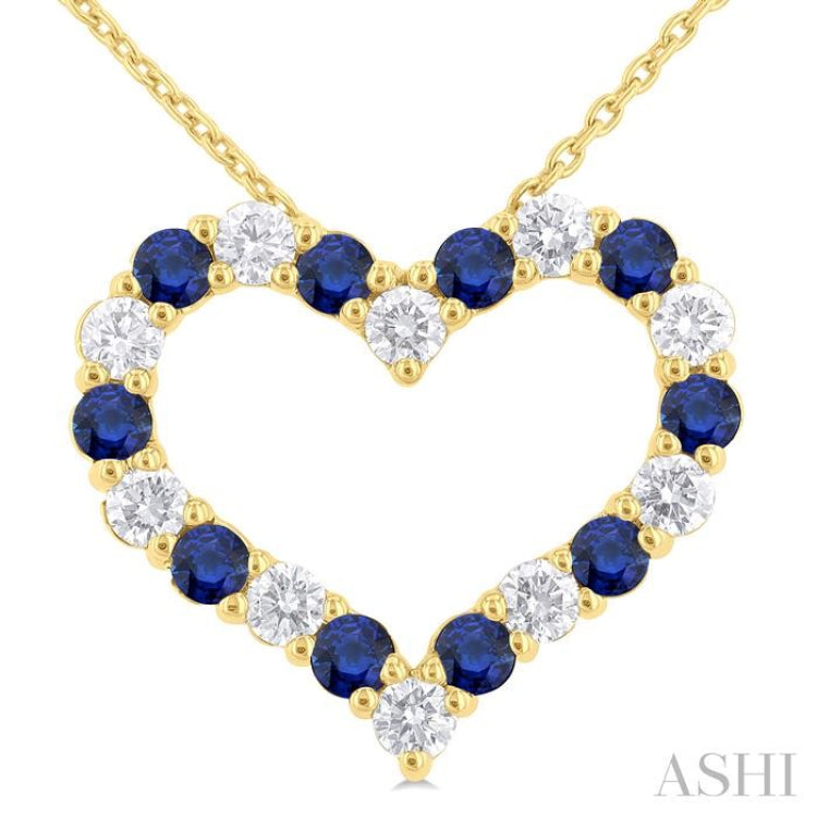 2.3 MM Round Cut Sapphire and 1/2 Ctw Open Heart Round Cut Diamond Precious Fashion Pendant With Chain in 14K Yellow Gold