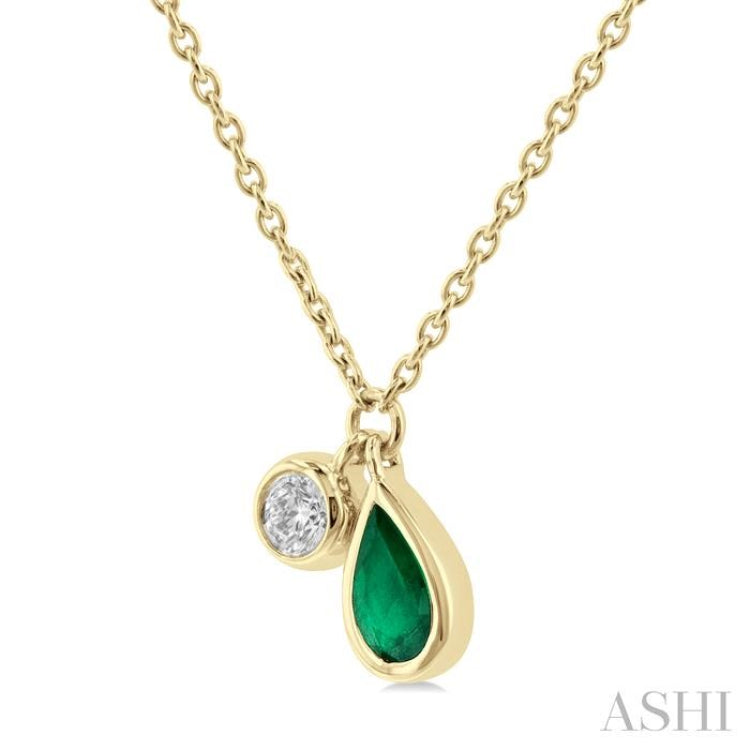 5x3 MM Pear Cut Emerald and 1/50 Ctw Bezel Set Round Cut Diamond Precious Pendant With Chain in 10K Yellow Gold